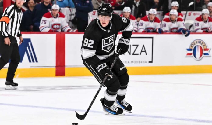 patrik-laine-los-angeles-kings-nhl-rumors-2026 Patrik Laine wearing a Los Angeles Kings home jersey and black helmet in a conceptual image illustrating NHL free-agent signing rumors linking him to LA in 2026.