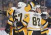Penguins Trade Rumors: Kyle Dubas Listening on Four Big Names as Pittsburgh Faces a New Problem Pittsburgh Penguins forwards Rickard Rakell (67) and Sidney Crosby (87) celebrate with teammates during an NHL game amid Penguins trade rumors involving Kyle Dubas, Erik Karlsson, Kris Letang and Bryan Rust.