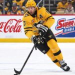 Penguins Trade Rumors: Is Bryan Rust About to Pay the Price for Pittsburgh’s Slow Start? Bryan Rust of the Pittsburgh Penguins skates with the puck as NHL trade rumors intensify amid speculation that Kyle Dubas could move veteran players in a roster shakeup.