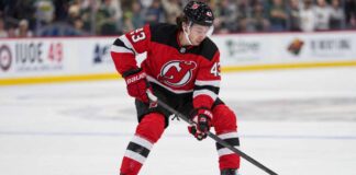 Quinn Hughes Trade Rumors Take a New Turn After Devils’ Blockbuster Quinn Hughes pictured in a New Jersey Devils home jersey as NHL trade rumors link the Minnesota Wild defenseman to New Jersey following the Connor Hellebuyck blockbuster trade.