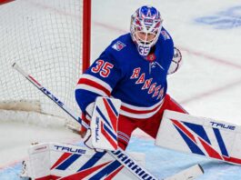 Sam Montembeault wearing a New York Rangers home jersey and goalie equipment in a mock trade image highlighting NHL trade rumors involving the Montreal Canadiens.