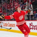 Simon Edvinsson Trade Rumors: Could the Islanders Force Detroit Into a $9 Million Decision? Simon Edvinsson of the Detroit Red Wings celebrates a goal beside New York Islanders defenseman Alexander Romanov as NHL trade rumors swirl around a potential $9 million Islanders offer sheet.
