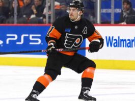 Travis Konecny wearing his Philadelphia Flyers home jersey during an NHL game as trade rumors intensify following the Flyers' historic winless start to the 2026-27 season.